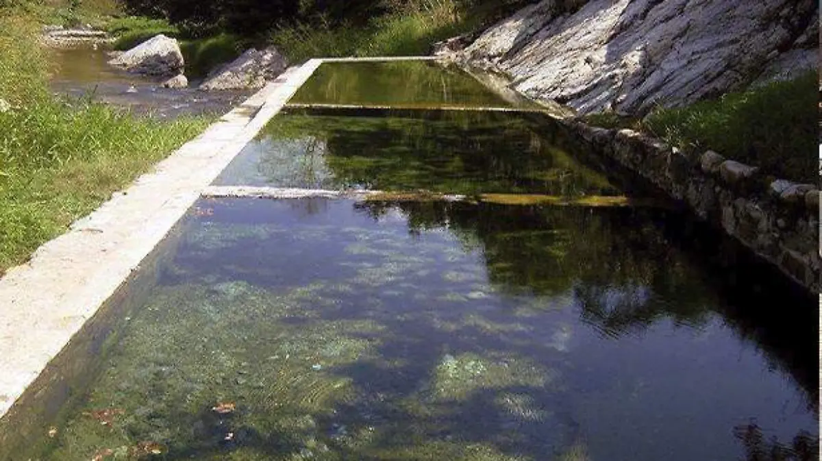 Resguardan balneario de aguas azufrosas